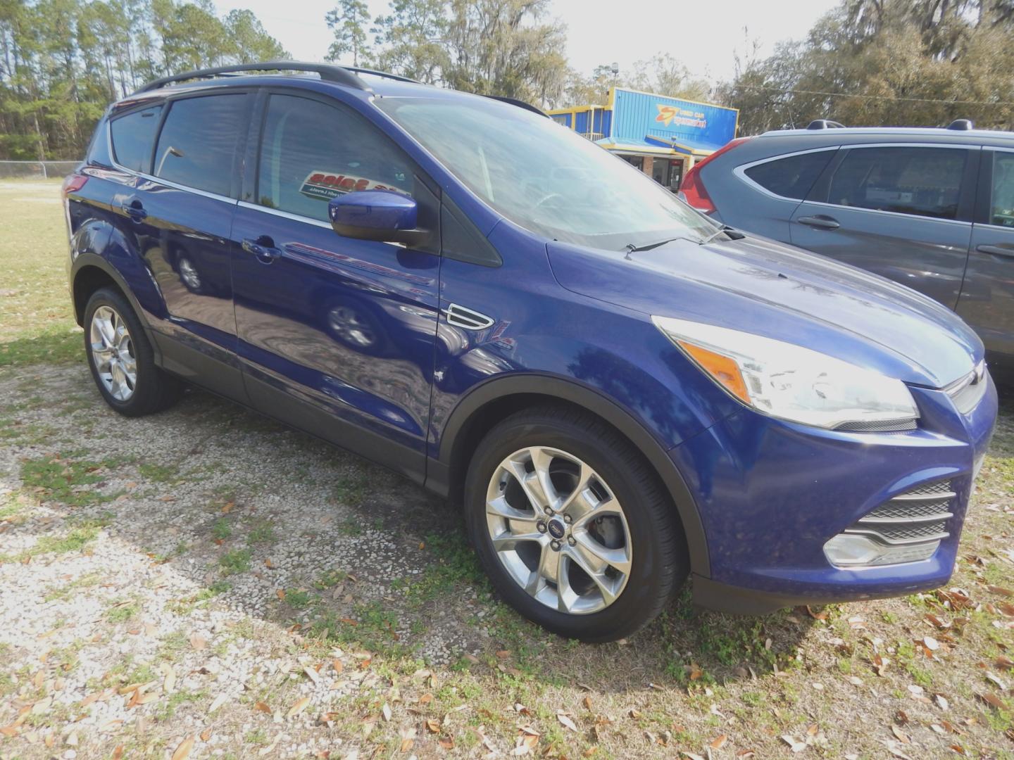 2013 Blue /Gray Ford Escape SE (1FMCU0GX3DU) with an 1.6L 4 cyl. engine, Automatic transmission, located at 3120 W Tennessee St, Tallahassee, FL, 32304-1002, (850) 575-6702, 30.458841, -84.349648 - Photo#1